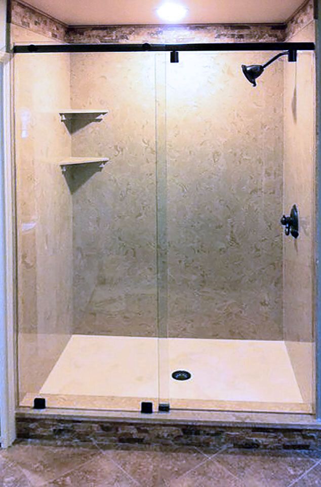 A sliding shower door