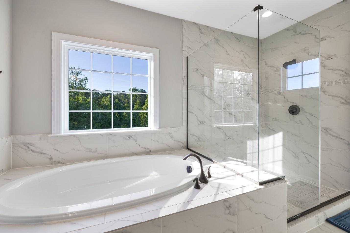Here are the reasons why you must choose a glass shower door over curtains