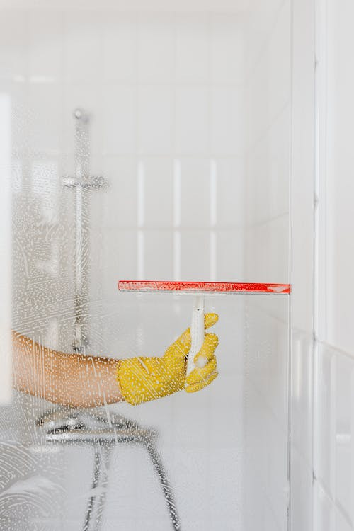 Cleaning a frameless shower enclosure