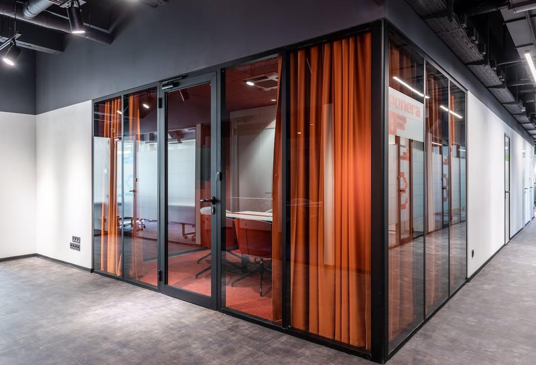 A conference room with glass doors