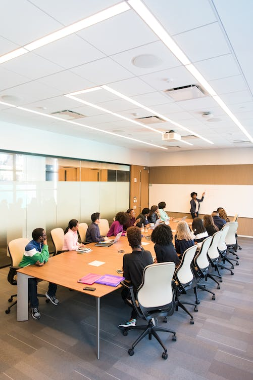 A conference room with glass doors 