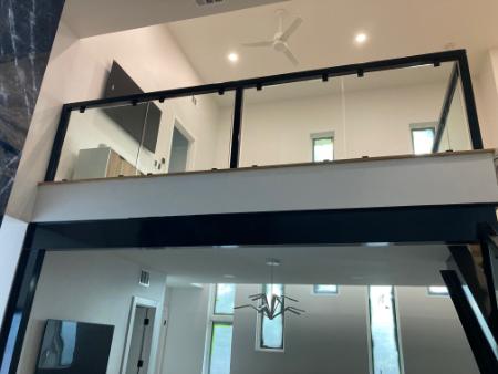 How Does Glass Railing Improve Your Commercial Property Value?